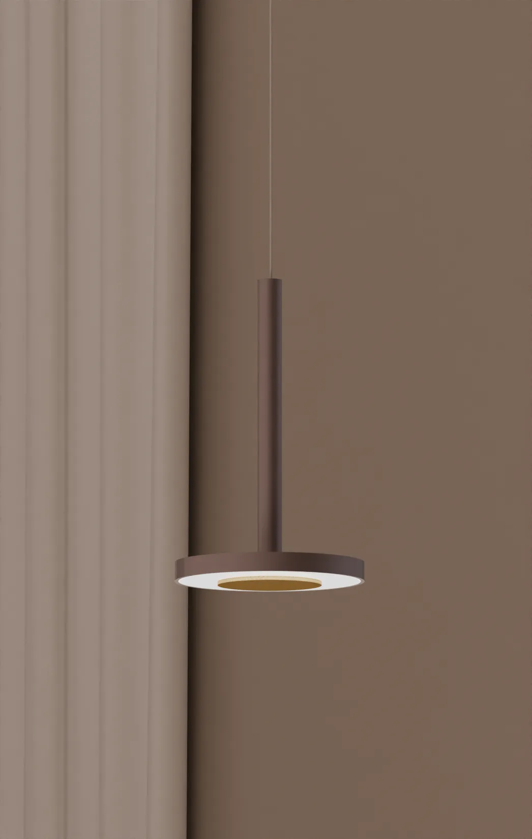 Dettaglio della sospensione in finitura bronzo contro una parete beige